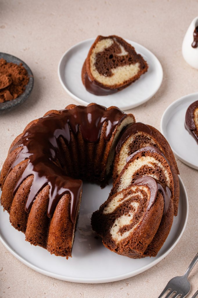 Chocolate marble bundt cake with chocolate glaze drizzled on top